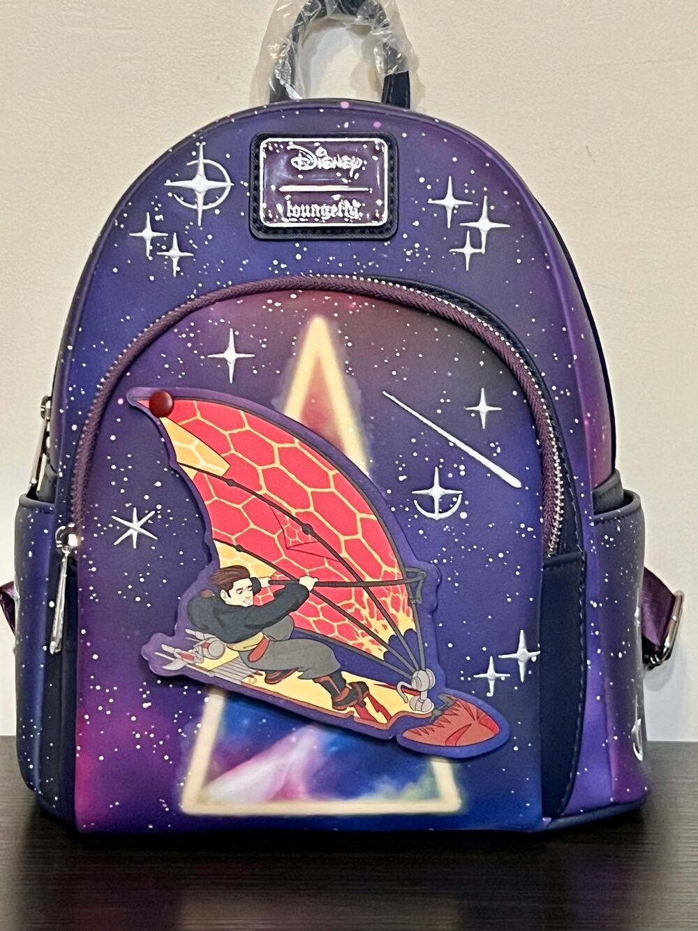 Loungefly Disney Treasure Planet Solar Surfer Glow-in-the-Dark Mini Backpack